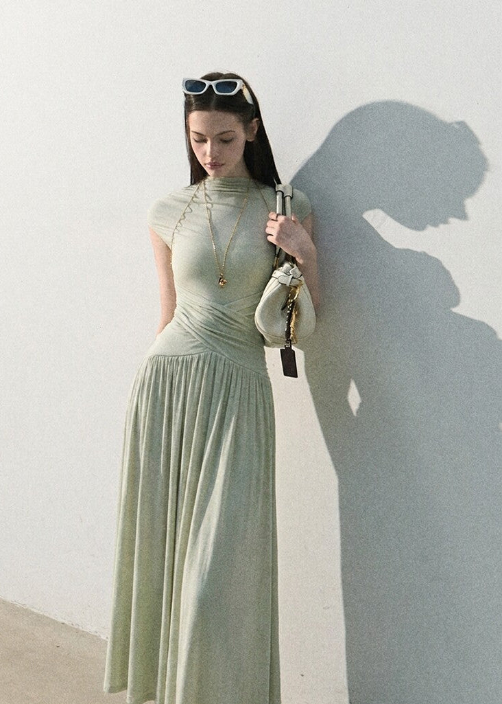 Sage green fitted bodice dress with full-length skirt