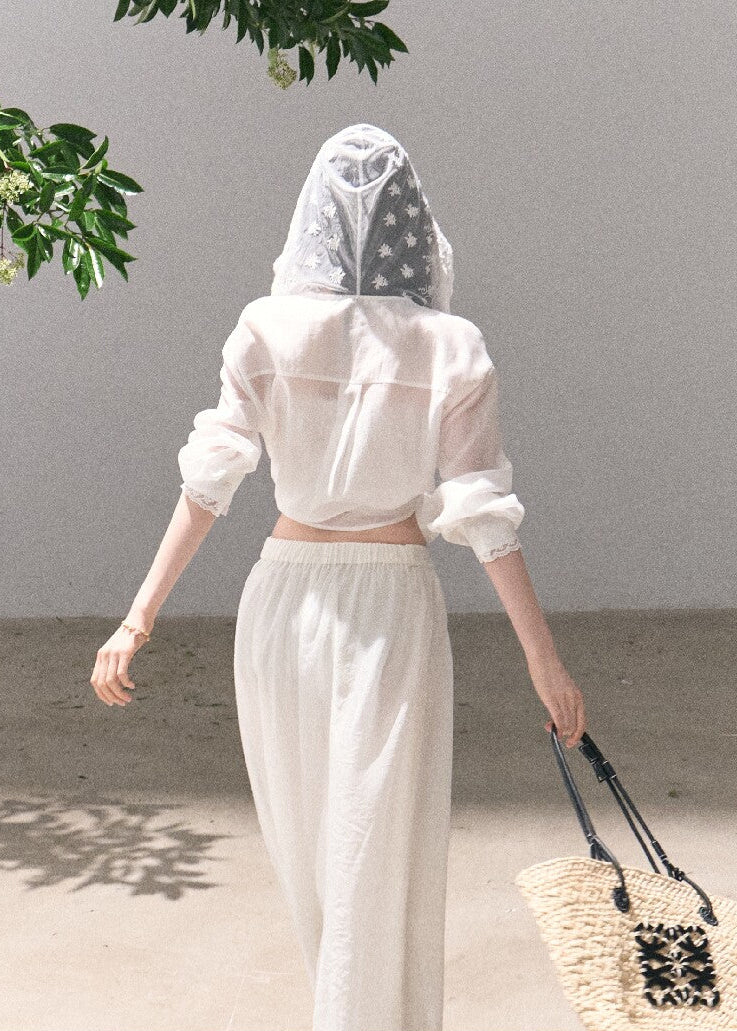 Romantic white hooded outer layer with lace details