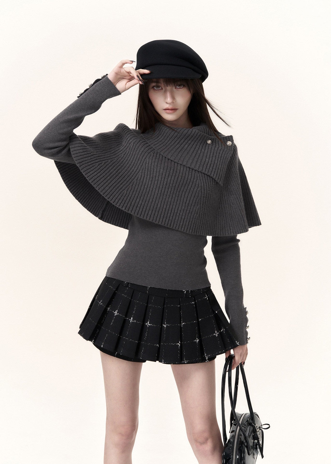 Grey asymmetric button-detail cape knit top with slim waist silhouette