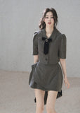 Cropped short-sleeve blazer featuring a jeweled velvet bow