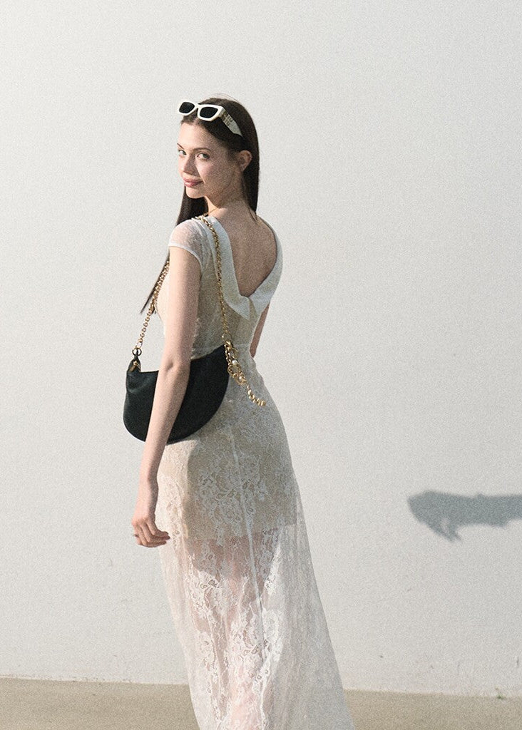 Long lace dress with delicate floral texture and cap sleeves