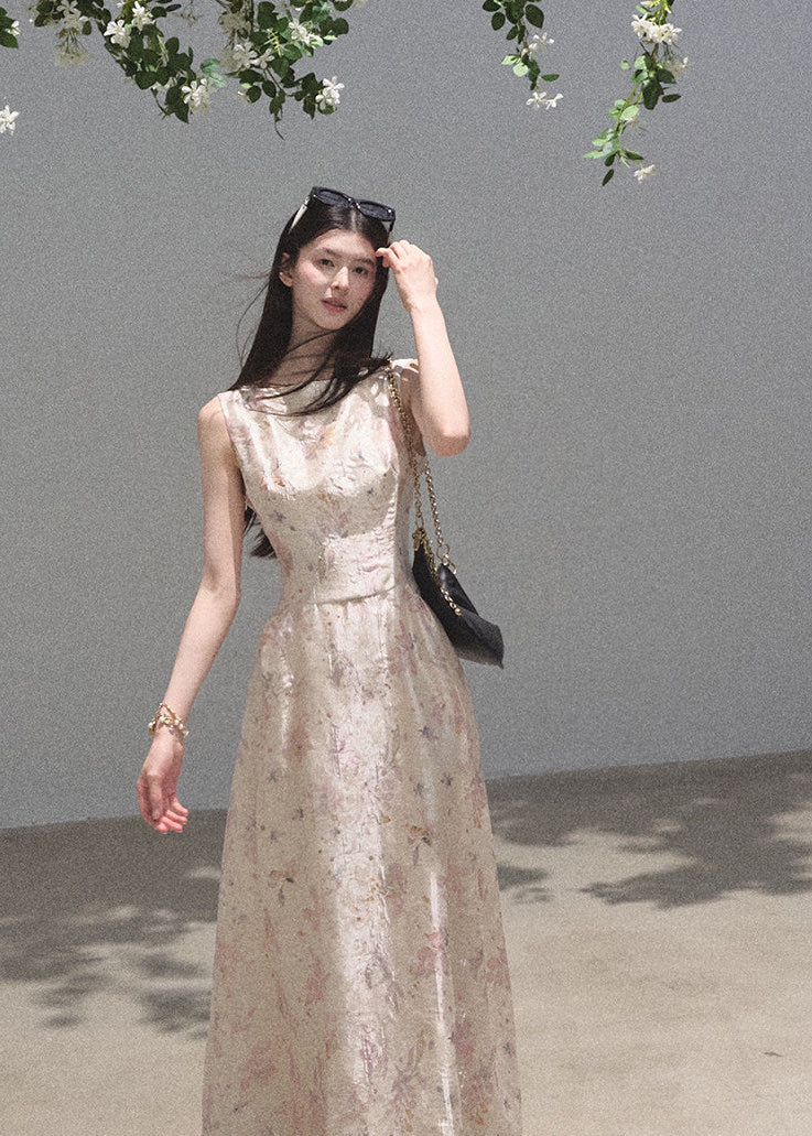 Soft pink floral dress styled with black boots