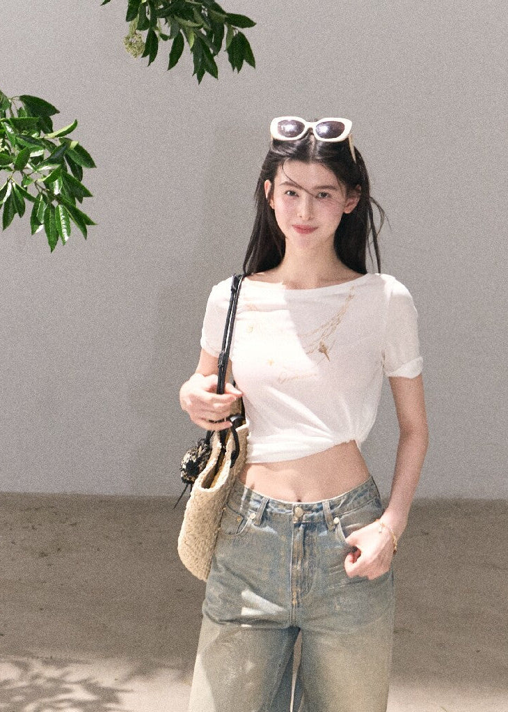 Light blue cotton jeans with shimmering surface detail