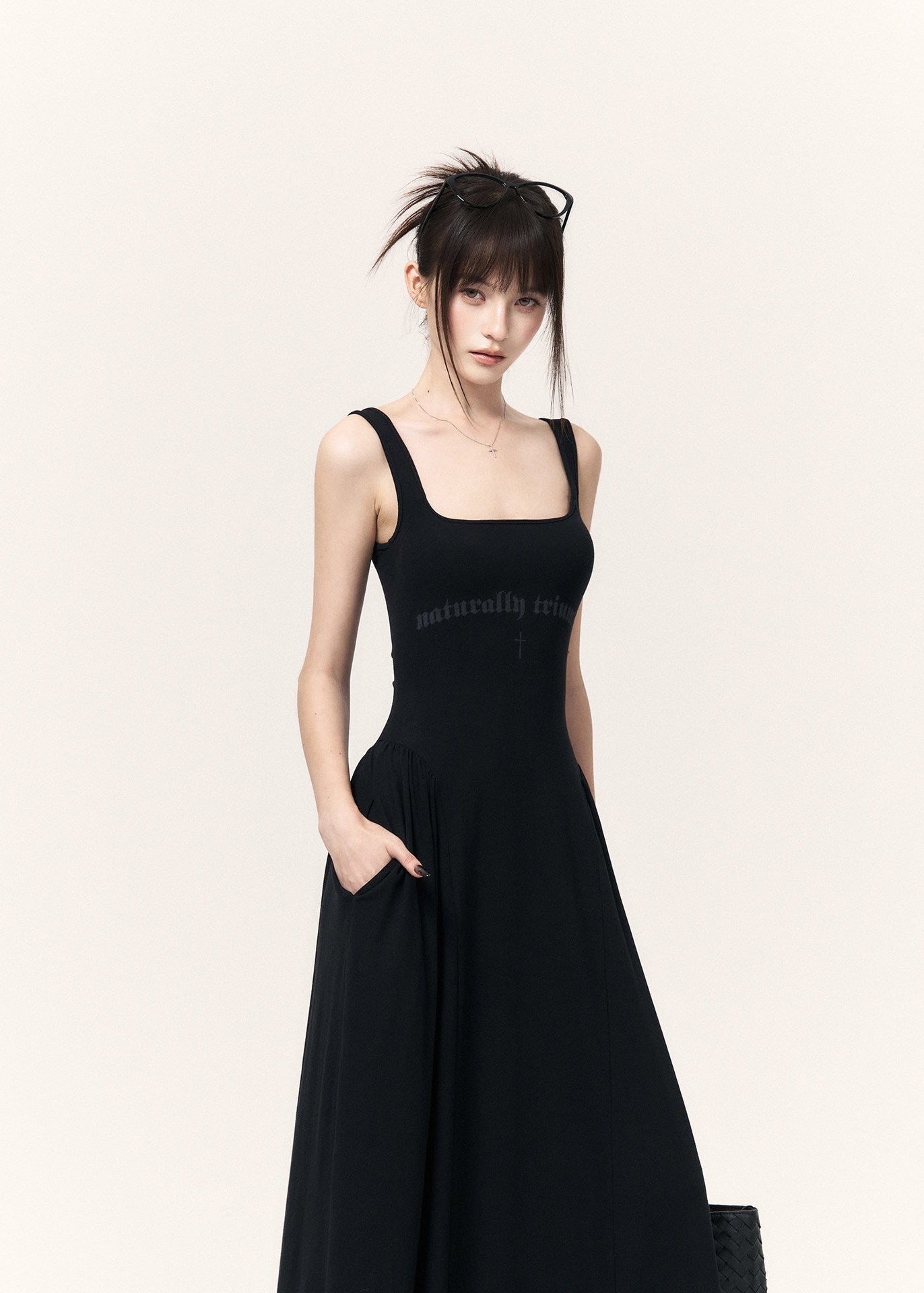 Women’s black fitted maxi dress and striped outer-layer set