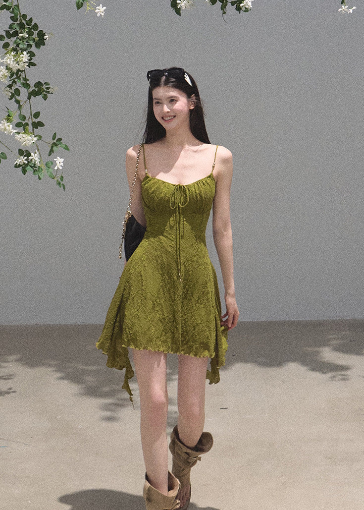 Romantic mini dress with delicate straps and flowing handkerchief hem