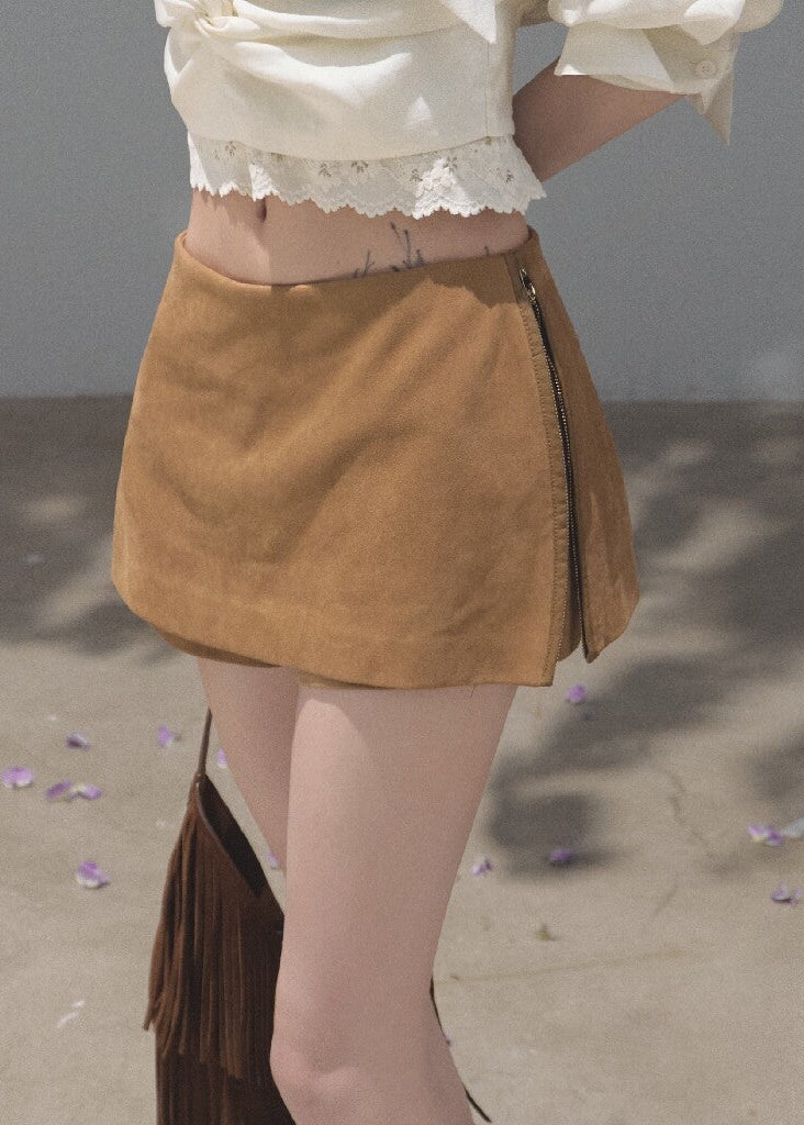 Ivory ribbon-tie cropped blouse with a softly gathered waist