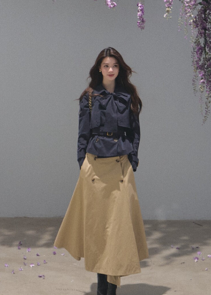 Khaki A-line midi skirt with a coordinating buckle belt