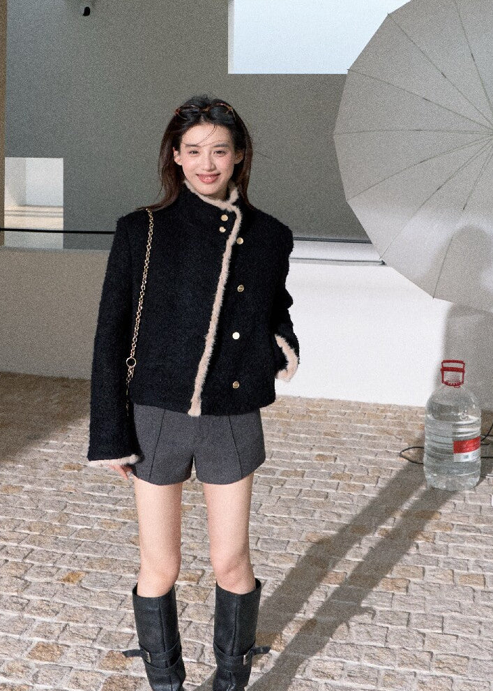 Elegant cropped wool blend jacket styled with grey tailored shorts