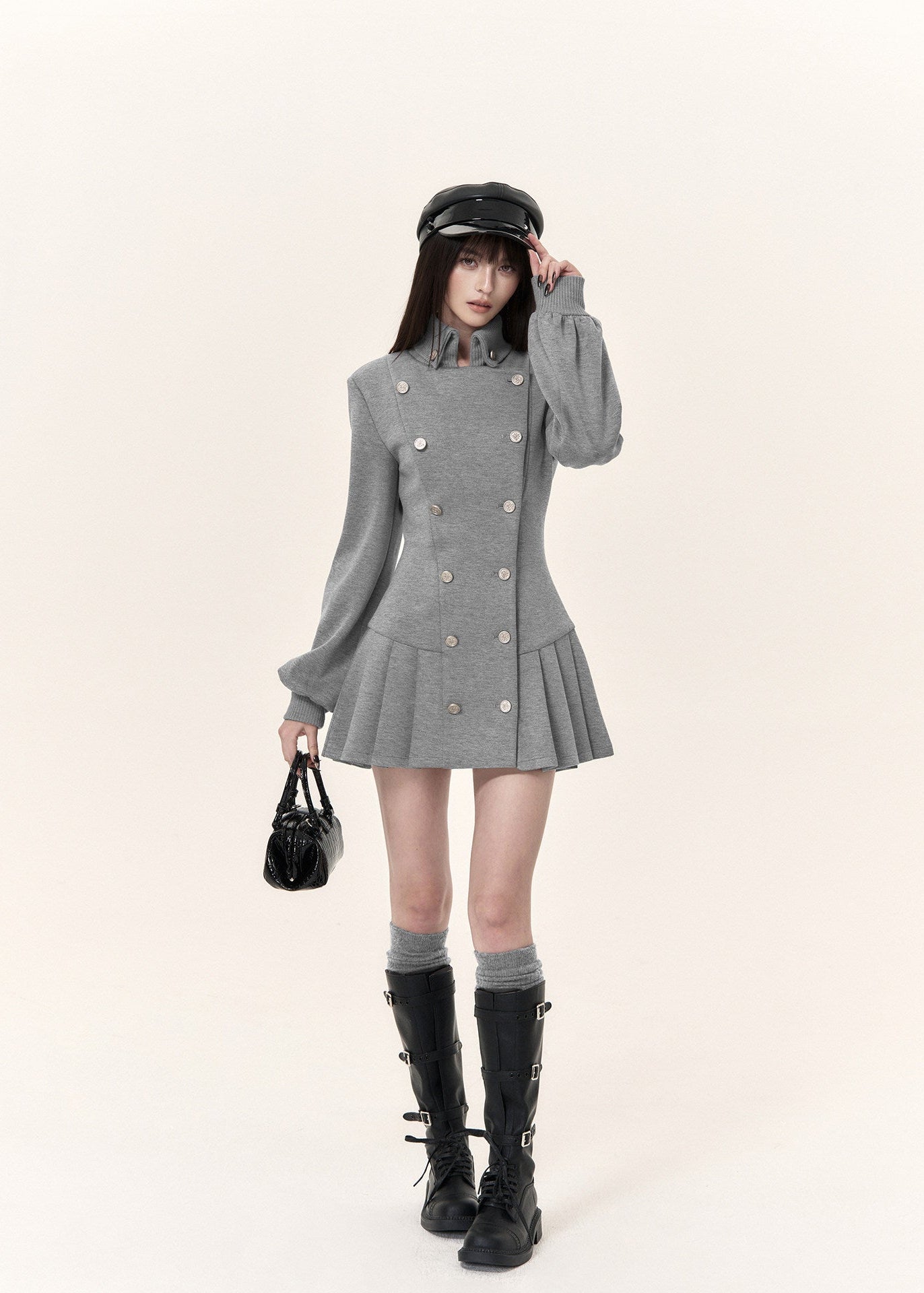 Grey double-breasted pleated mini dress with military-inspired stand collar