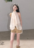 Sleeveless A-line top with soft asymmetric drape