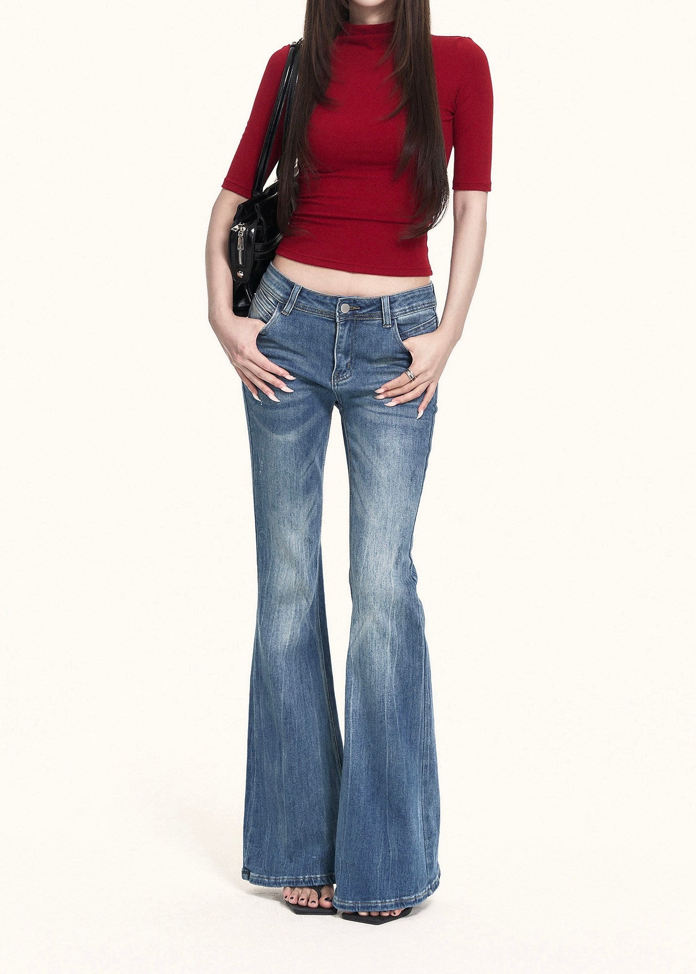 Red high-neck top with subtle back cutout