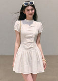 White puff-sleeve mini dress with fitted waist