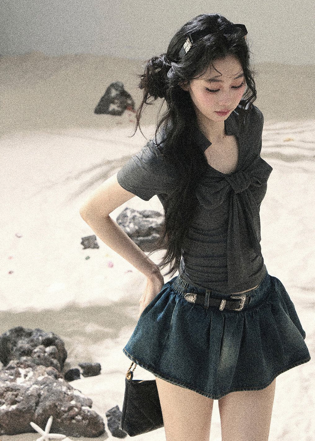 Charcoal waist-fit top with feminine bow neckline