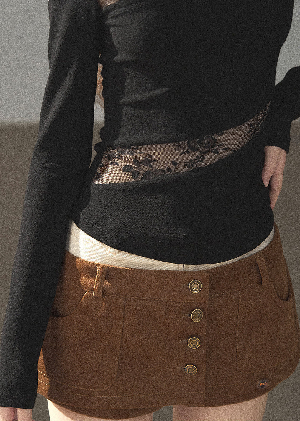 Feminine lace long sleeve top with fitted waist