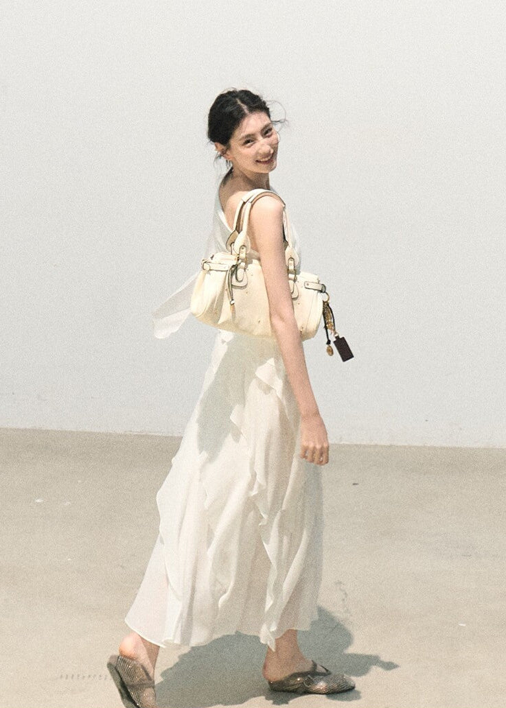 Elegant white slip dress with a one-shoulder neckline