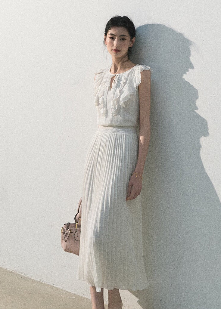 White ruffle pleated dress with a softly defined waist