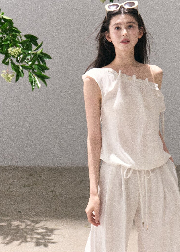 Ivory draped top and wide-leg pants set
