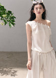 Ivory draped top and wide-leg pants set