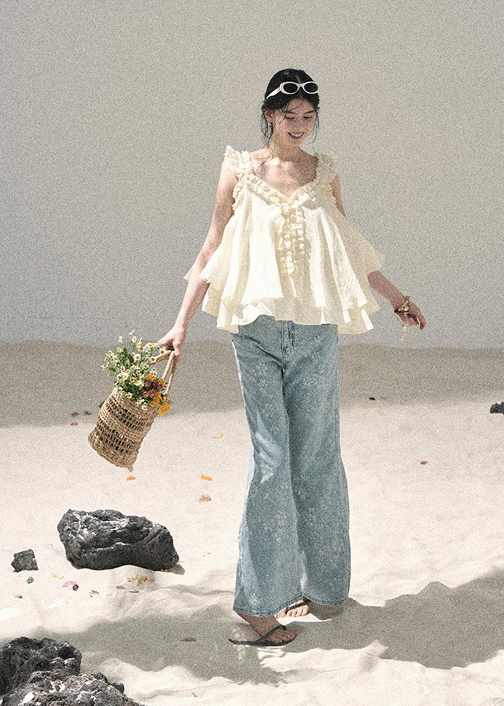High-waisted wide-leg jeans with subtle crystal details