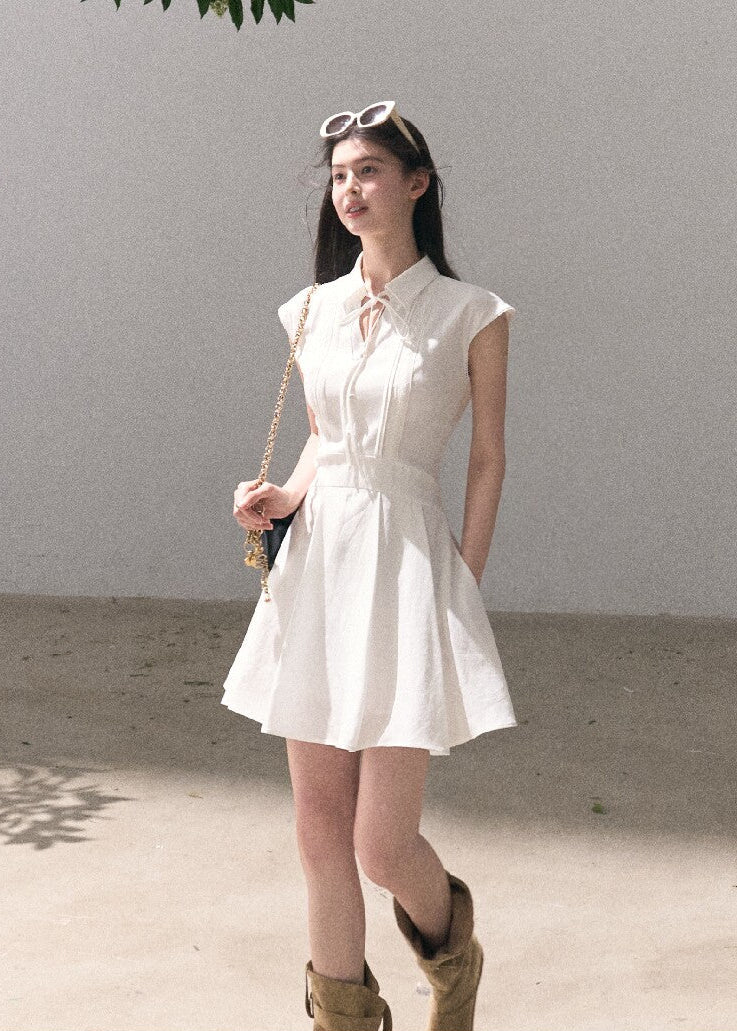 Elegant short white shirt dress with cap sleeves