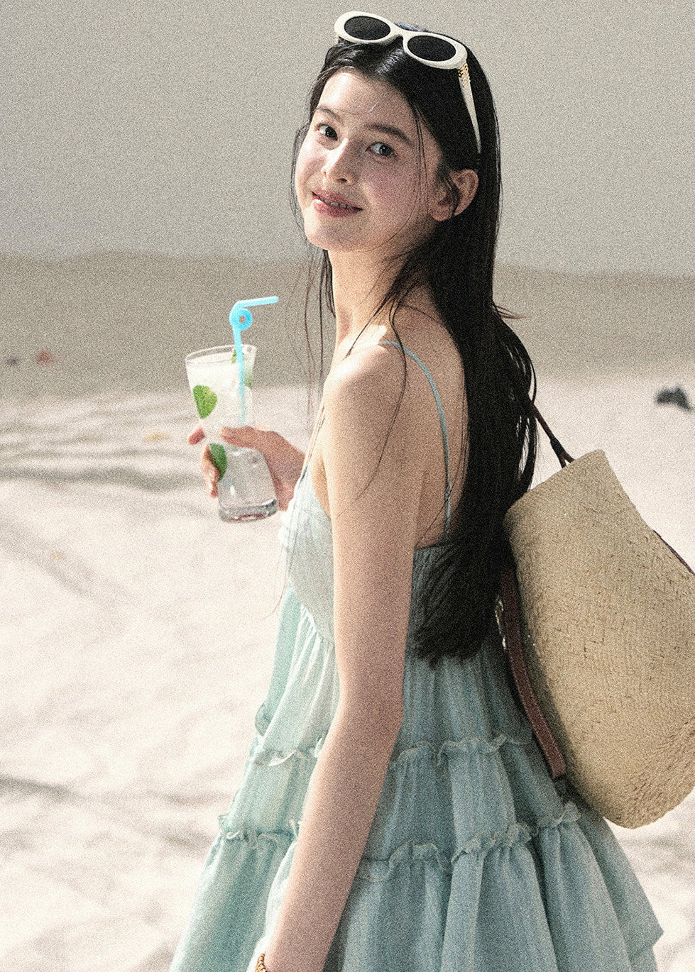 Women’s seafoam tiered mini dress for a seaside vacation