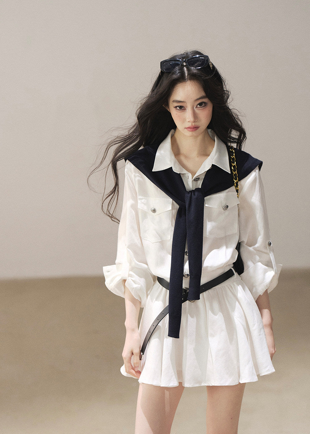 White long sleeve dress with dark shoulder shawl