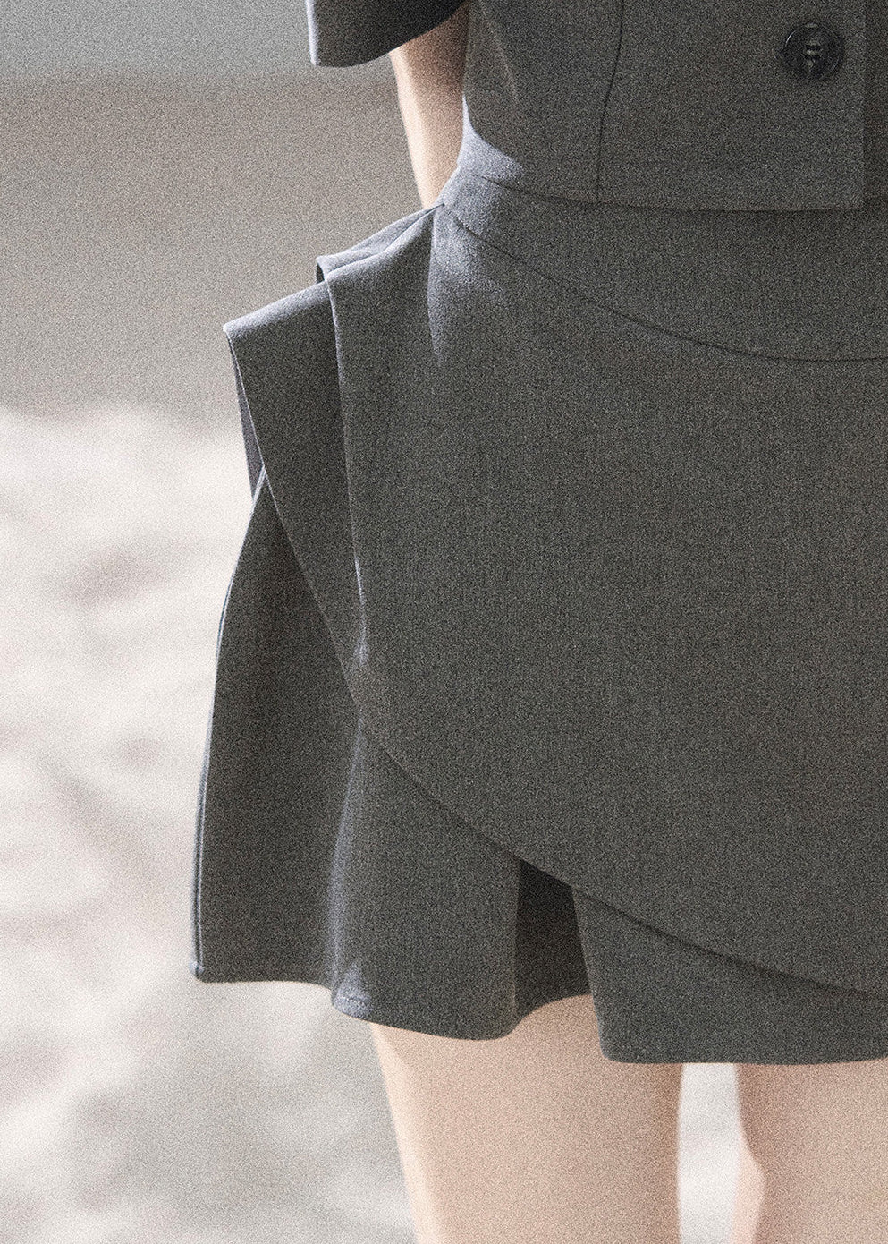 Romantic gray two-piece set with a black statement bow