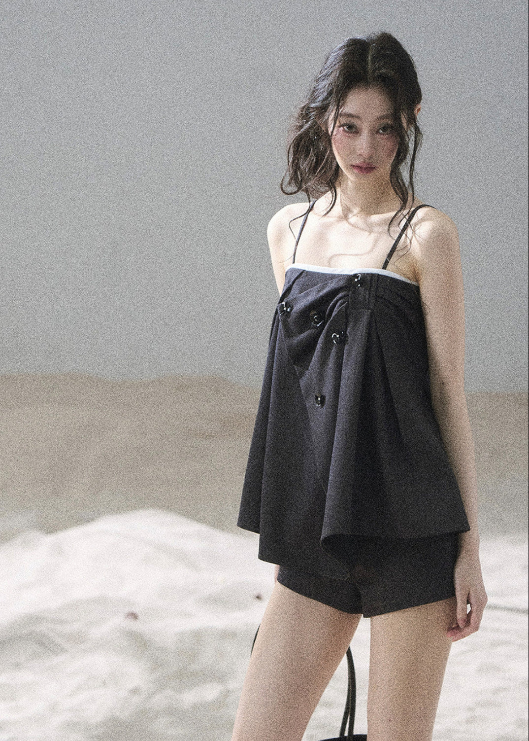 Relaxed flared camisole styled with matching tailored shorts