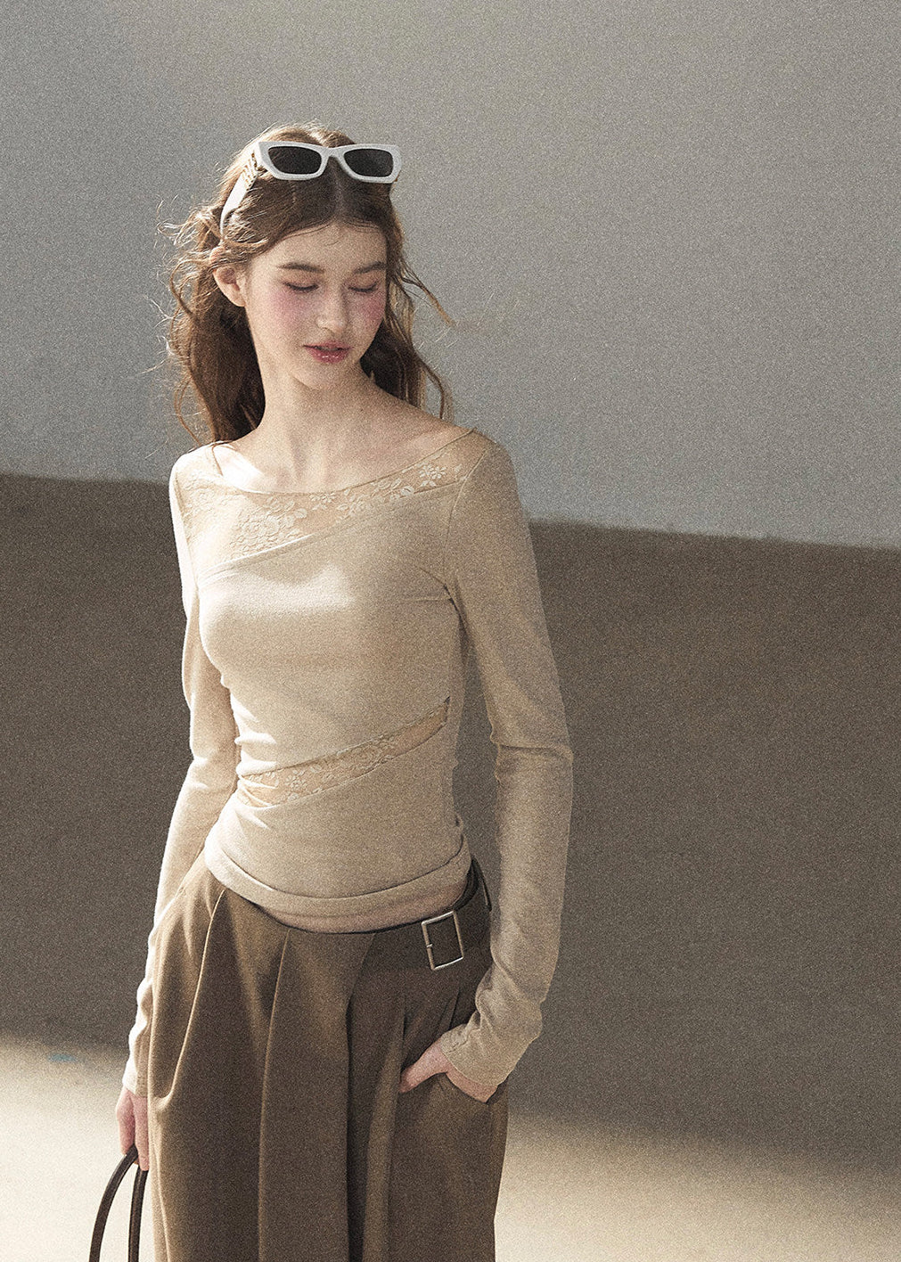Soft ivory lace top with delicate sheer texture