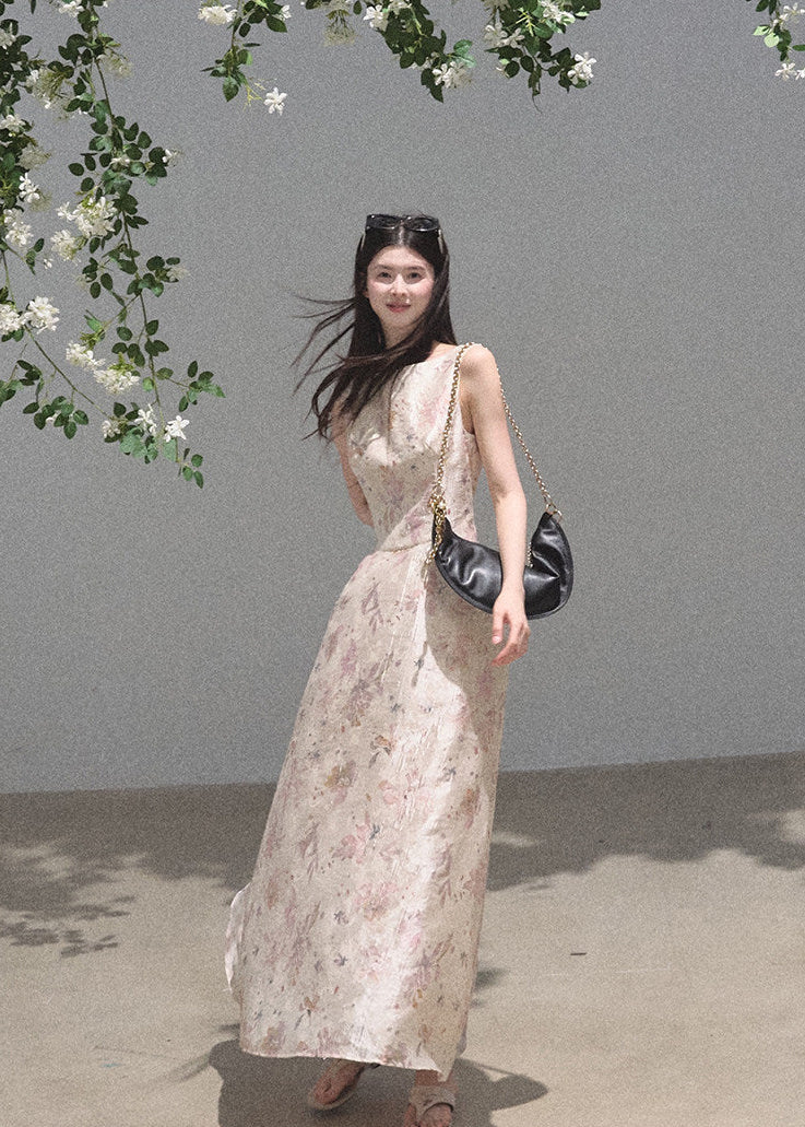 Soft pink floral dress styled with black boots