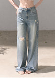 Light wash wide-leg jeans with rhinestone details