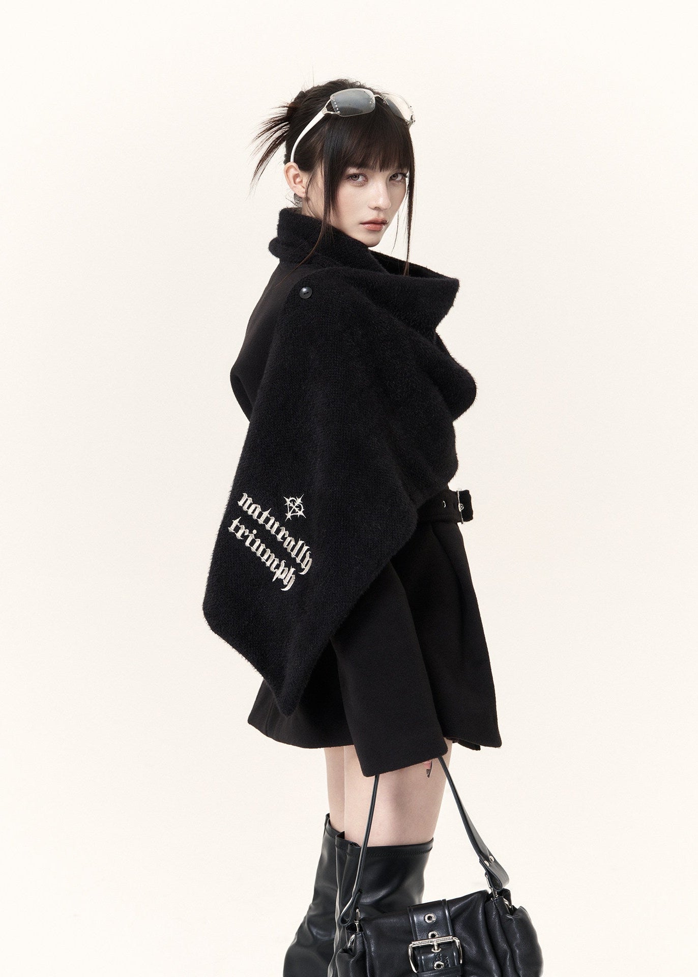 Gothic-inspired black double-breasted coat with statement scarf collar
