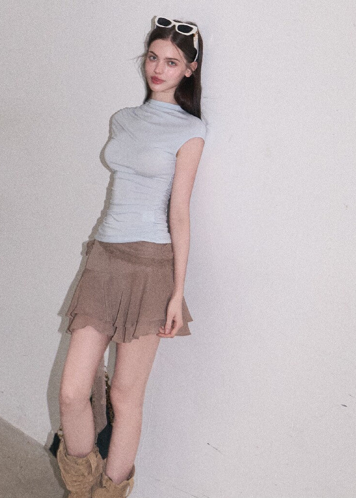 Warm taupe mini skirt with feminine layers