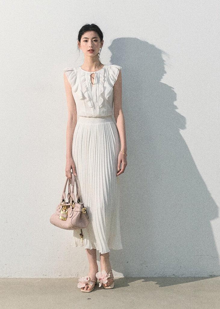 White ruffle pleated dress with a softly defined waist