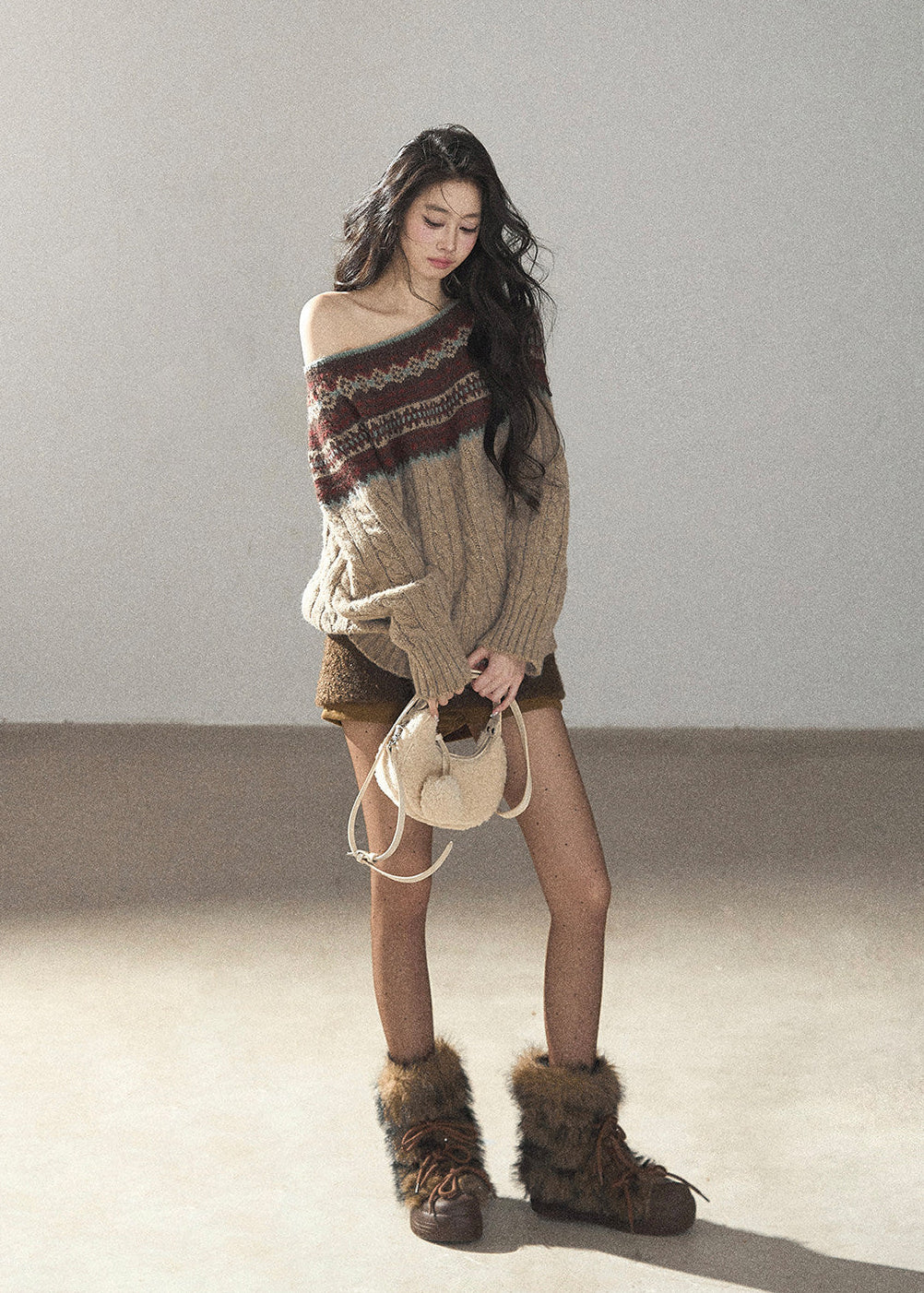 Beige Fair Isle off-shoulder cable knit sweater with multicolor jacquard pattern