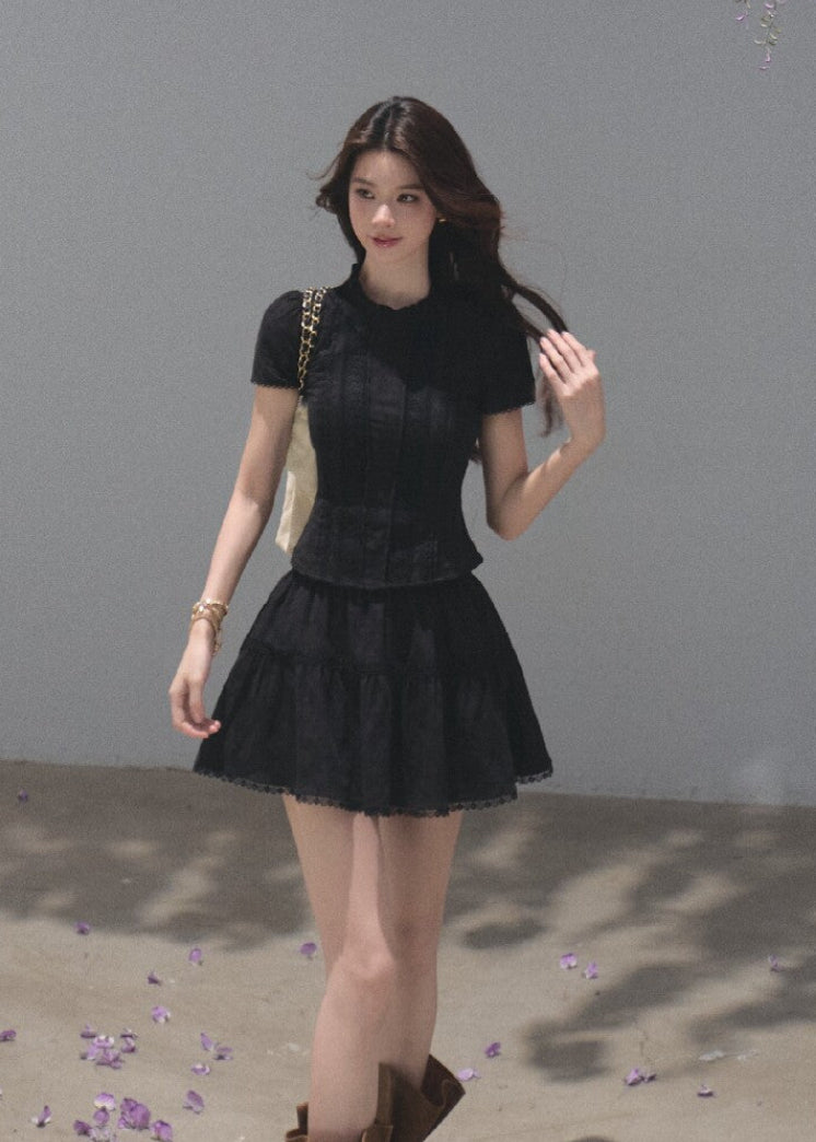 White cotton short-sleeve top and tiered mini skirt two-piece set