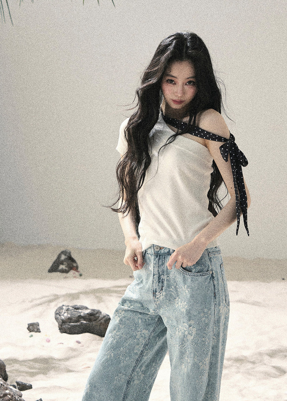 High-waisted wide-leg jeans with subtle crystal details