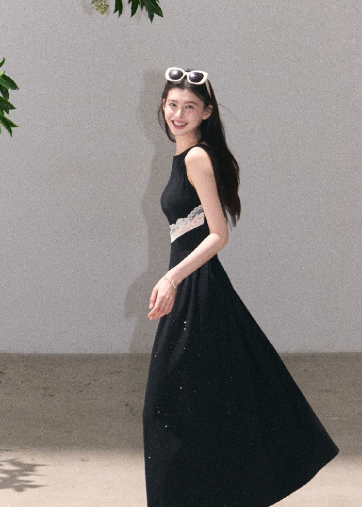 Black sleeveless maxi dress with delicate lace cutout