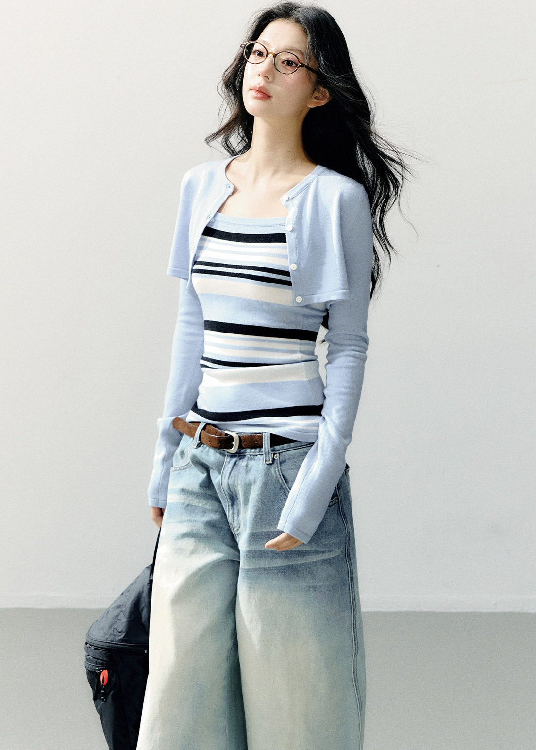 Women’s two-piece knit top set with long sleeves and stripes