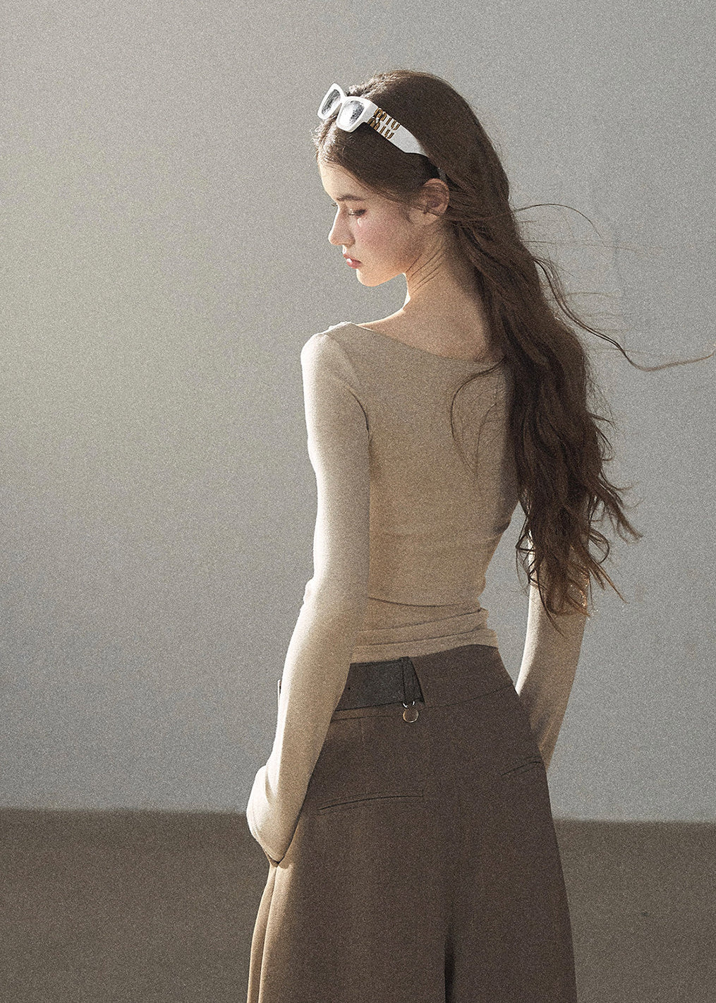 Soft ivory lace top with delicate sheer texture