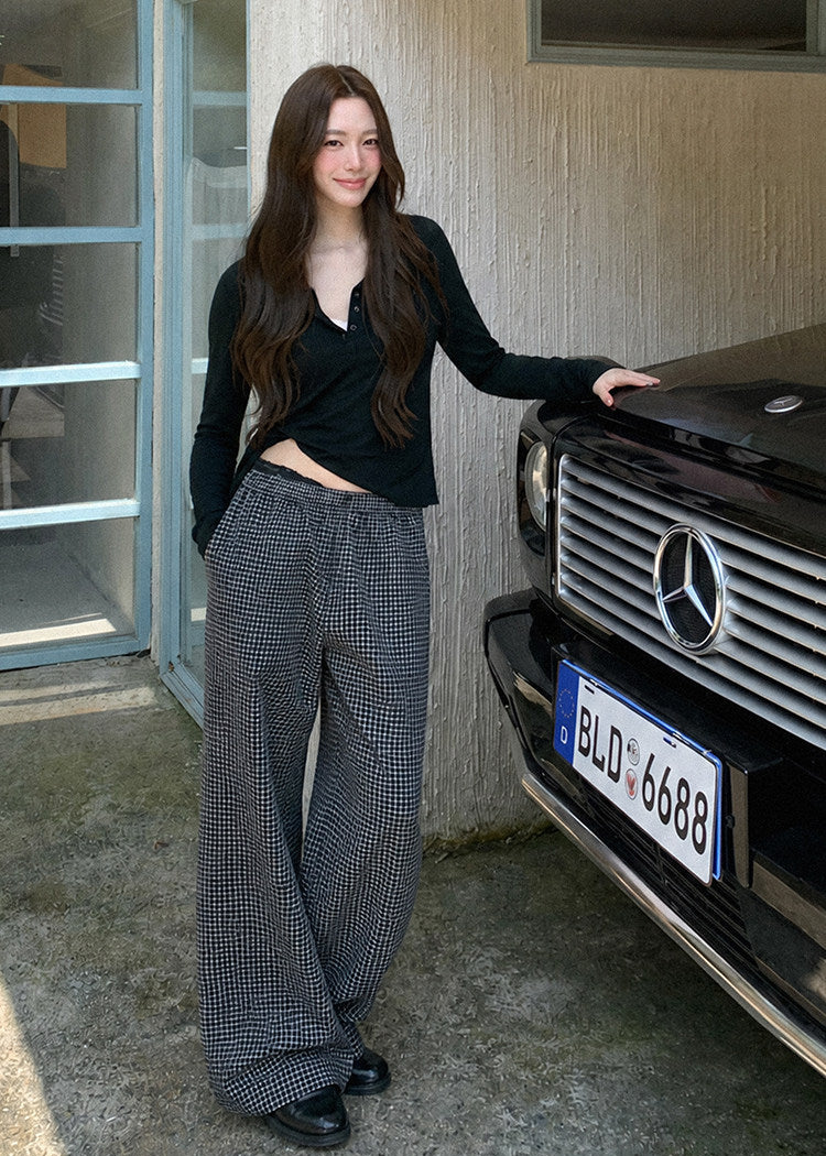 Relaxed black wool-blend Henley shirt styled with plaid pants