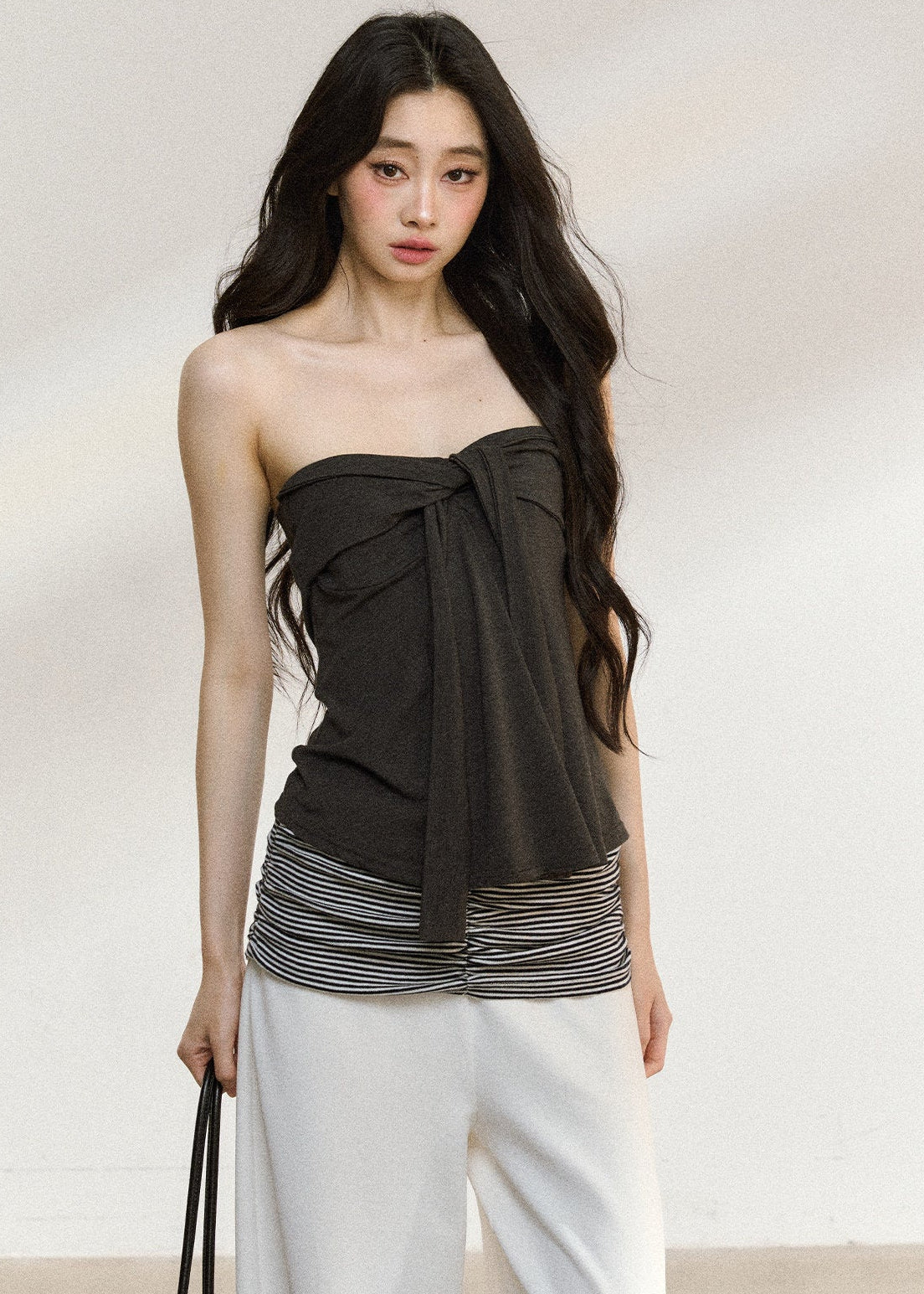Women’s white cardigan and striped-hem camisole set