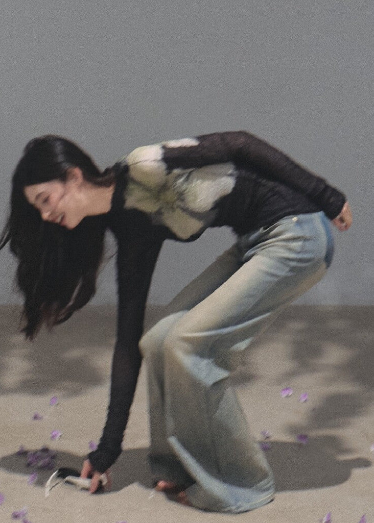 Cotton-rich slight-flare jeans featuring a faded two-tone wash
