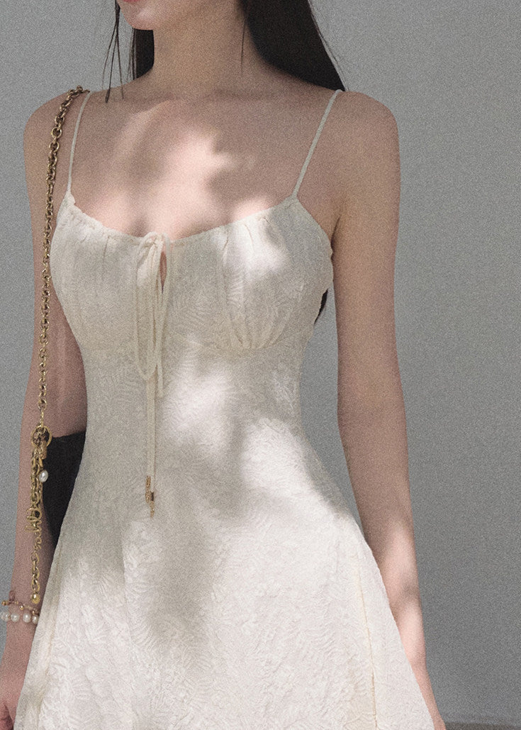 Soft cream jacquard mini dress with feminine fairy-inspired fit