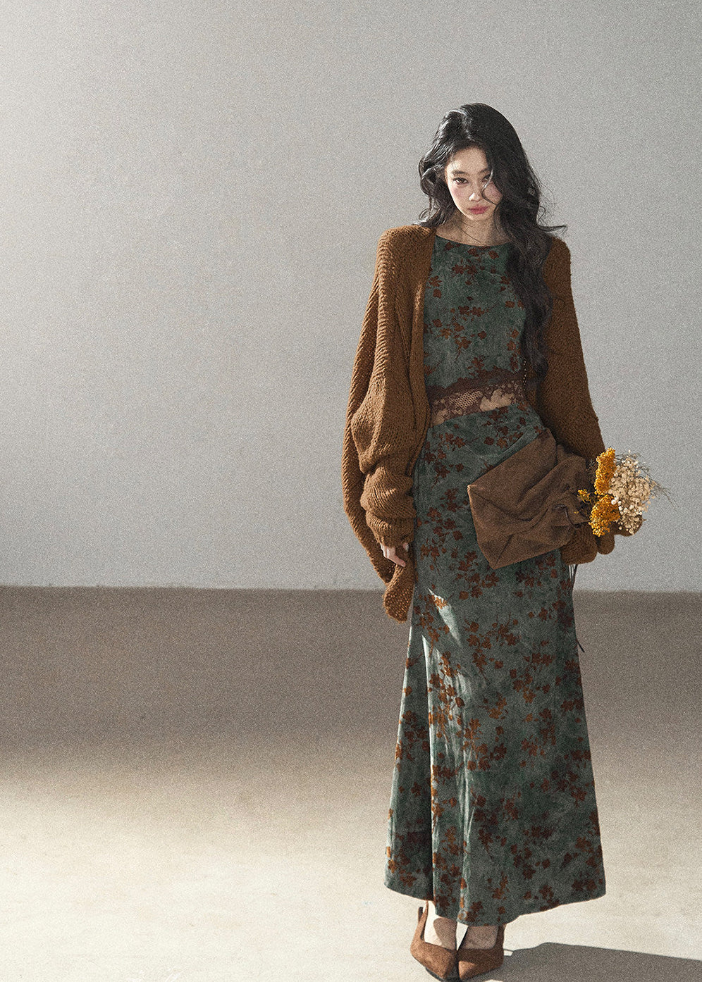 Romantic floral maxi dress with fitted waist and softly flared hem