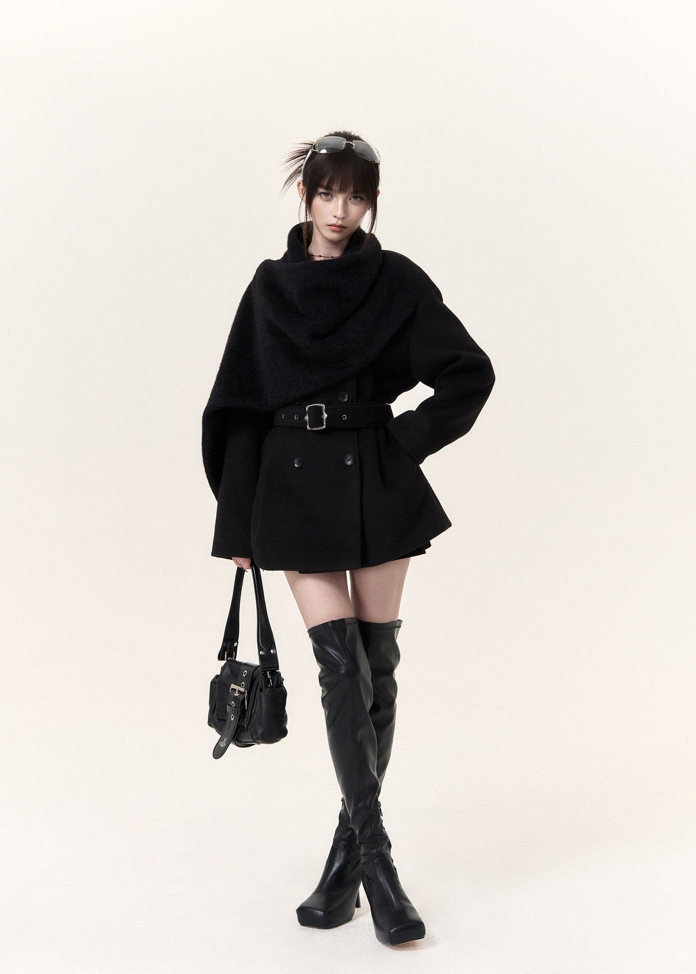 Gothic-inspired black double-breasted coat with statement scarf collar
