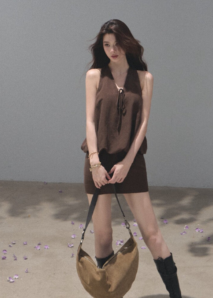 White open-back halter dress crafted from a lyocell-linen blend