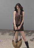 White open-back halter dress crafted from a lyocell-linen blend