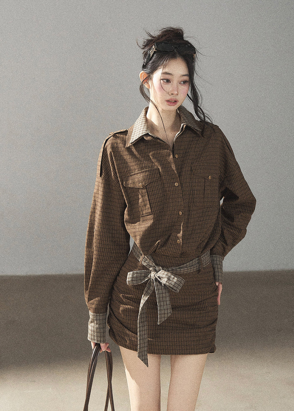 Vintage-inspired brown plaid shirt dress