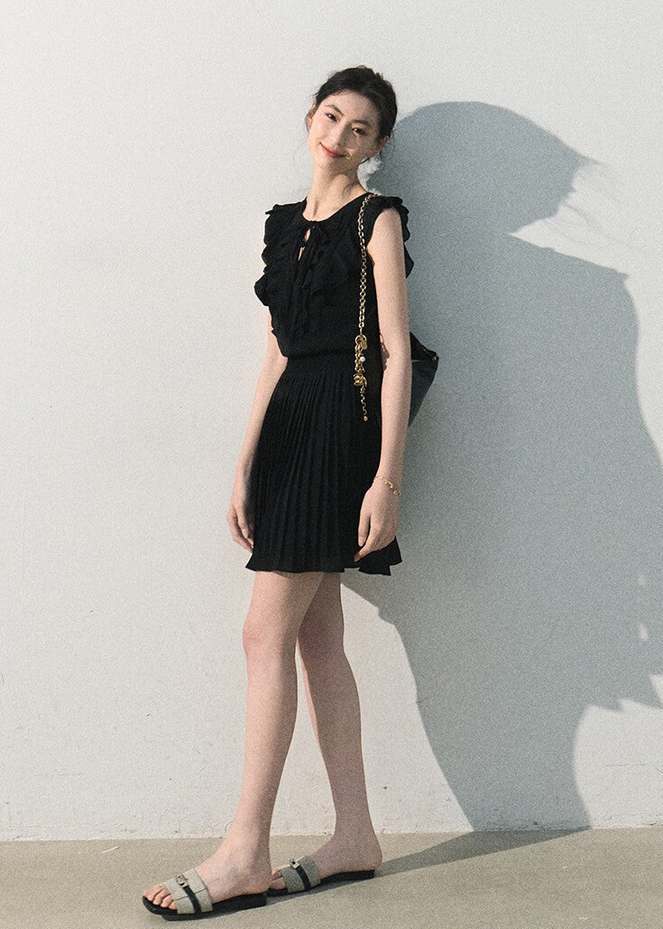 Black ruffle pleated dress with a feminine A-line silhouette